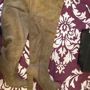 High thigh boots tan color with heel.